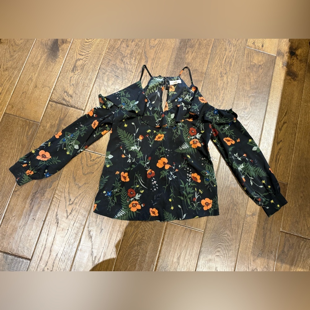 Coverstitched open shoulder blouse